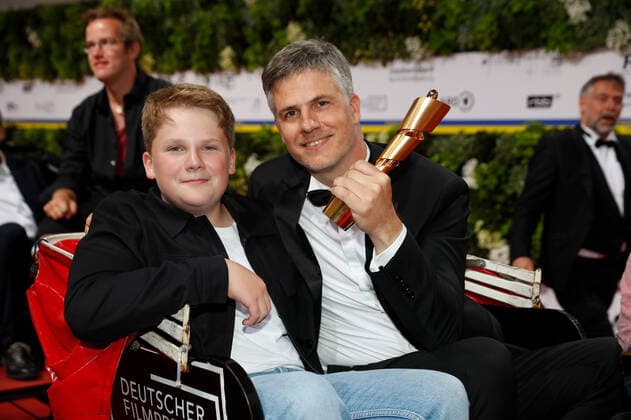 German Film Award 2022 Julius Weckauf with Daniel Ehrenberg on the red carpet at the Lola German Film Award 2021 ceremony at the Palais am Funkturm in Messe Berlin Copyright: xEventpressxGolejewskix