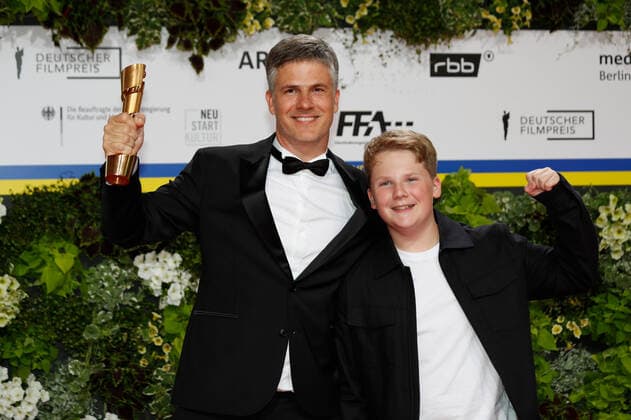 German Film Award 2022 Julius Weckauf with Daniel Ehrenberg on the red carpet at the Lola German Film Award 2021 ceremony at the Palais am Funkturm in Messe Berlin Copyright: xEventpressxGolejewskix