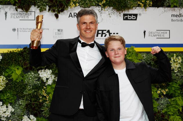 German Film Award 2022 Julius Weckauf with Daniel Ehrenberg on the red carpet at the Lola German Film Award 2021 ceremony at the Palais am Funkturm in Messe Berlin Copyright: xEventpressxGolejewskix