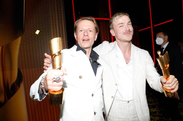 German Film Award 2022 Alexander Scheer and Albrecht Schuch at the party during the Lola German Film Award 2021 ceremony at the Palais am Funkturm in Messe Berlin Copyright: xEventpressxGolejewskix