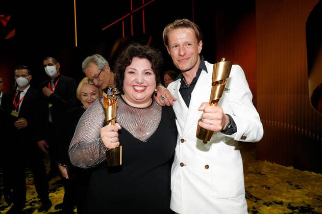 German Film Award 2022 Meltem Kaptan and Alexander Scheer at the party during the Lola German Film Award 2021 ceremony at the Palais am Funkturm in Messe Berlin Copyright: xEventpressxGolejewskix