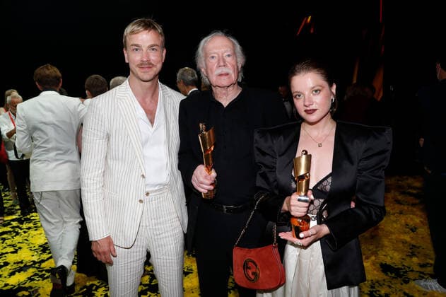 German Film Award 2022 Albrecht Schuch and Jürgen Jürges with Jella Haase at the party at the Lola German Film Award 2021 ceremony at the Palais am Funkturm in Messe Berlin Copyright: xEventpressxGolejewskix