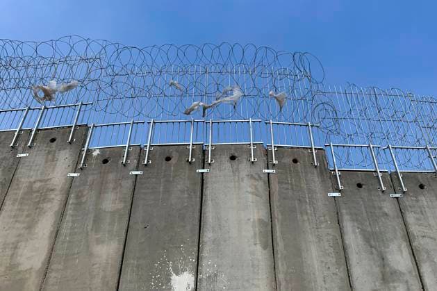 View of the Separation Barrier by Israel in Jerusalem. After suicide attacks during Second Intifada (2000-2005), Israel began the construction of a security barrier in June 2002 that prevents the free circulation from the occupied West Bank and it is known as the Apartheid Wall among palestinian people. The wall is under construction yet after 20 years, covering 600 kilometers out of the planed 720 km of length. 20th anniversary of construction of the Separation Barrier by Israel !ACHTUNG: NUR REDAKTIONELLE NUTZUNG!  Copyright: xYemelixOrtegax GRAF7816 20220626-445990caed9929deffe0968d42f18c47ddb329cd