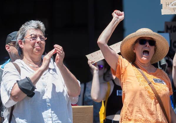 June 26, 2022, Montreal, PQ, Canada: People take part in a protest to denounce the United States Supreme Court s decision to overturn the law that provided the constitutional right to abortion for almost 50 years, in Montreal, Sunday, June 26, 2022. Montreal Canada  - ZUMAc35_ 20220626_zaf_c35_043 Copyright: xGrahamxHughesx