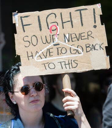 June 26, 2022, Montreal, PQ, Canada: People take part in a protest to denounce the United States Supreme Court s decision to overturn the law that provided the constitutional right to abortion for almost 50 years, in Montreal, Sunday, June 26, 2022. Montreal Canada  - ZUMAc35_ 20220626_zaf_c35_042 Copyright: xGrahamxHughesx