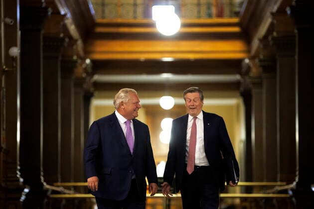 June 27, 2022, TORONTO, ON, Canada: Ontario premier Doug Ford walks alongside Toronto mayor John Tory on their way to a joint press conference inside QueenöÄÃ s Park in Toronto, Monday, June 27, 2022. TORONTO Canada  - ZUMAc35_ 20220627_zaf_c35_045 Copyright: xColexBurstonx