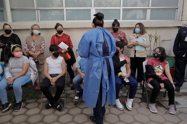 Vaccination Of Children Aged 5 To 11 Years Against COVID-19 Begins In Mexico City Medical staff in front of a group of children under 11 years of age under observation after being vaccinated against COVID-19 with the Pfizer-BioNTech biologic inside the Centro de Salud T-III Dr. Juan Duque de Estrada in Mexico City. Mexico City Mexico City Mexico  Copyright: xGerardoxVieyrax originalFilename: vieyra-notitle220627_npbae.jpg