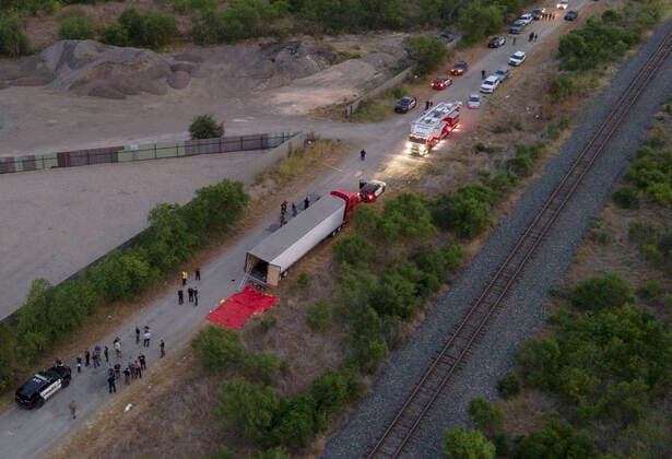 (220628) -- SAN ANTONIO (U.S.), June 28, 2022 -- Photo taken on June 27, 2022 shows the scene of an alleged human smuggling mass casualty event in San Antonio, Texas, the United States. The death toll of migrants found on Monday inside a cloned and abandoned 18-wheeler in San Antonio has risen to 50, authorities said on Tuesday. (Photo by Xinhua) U.S.-TEXAS-SAN ANTONIO-MIGRANTS-DEATH TOLL NickxWagner 