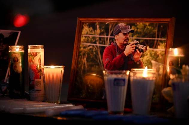 January 21, 2022, Tijuana, Baja California, Mexico: Colleagues of slain Tijuana photojournalist Margarito MartoÂ­nez Esquivel gathered to commemorate his life and passing at a candlelight vigil memorial in Tijuana, Mexico on Friday, January 21, 2022. ..Esquivel was assassinated on Monday by gun point steps away from his home as he was leaving to work (he was one of TijuanaÃ¢â‚¬â ¢s most prominent and regular photographers covering the cityÃ¢â‚¬â ¢s violence). ..He leaves a wife and a 16 year old daughter behind, as well as a city left without a consistent experienced daily reporter on the police beat. Tijuana Mexico - ZUMAm180 20220121_zip_m180_003 Copyright: xCarlosxA.xMorenox