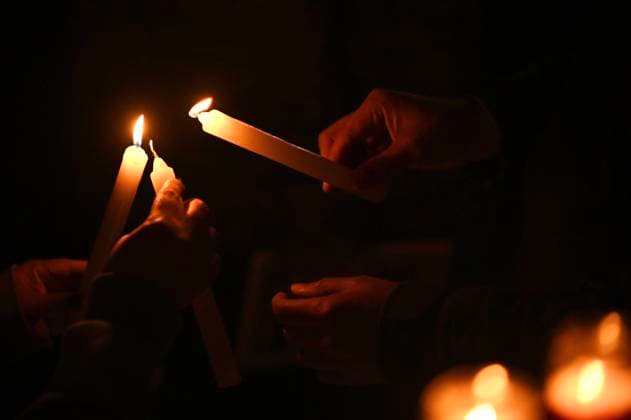 January 21, 2022, Tijuana, Baja California, Mexico: Colleagues of slain Tijuana photojournalist Margarito MartoÂ­nez Esquivel gathered to commemorate his life and passing at a candlelight vigil memorial in Tijuana, Mexico on Friday, January 21, 2022. ..Esquivel was assassinated on Monday by gun point steps away from his home as he was leaving to work (he was one of TijuanaÃ¢â‚¬â ¢s most prominent and regular photographers covering the cityÃ¢â‚¬â ¢s violence). ..He leaves a wife and a 16 year old daughter behind, as well as a city left without a consistent experienced daily reporter on the police beat. Tijuana Mexico - ZUMAm180 20220121_zip_m180_004 Copyright: xCarlosxA.xMorenox