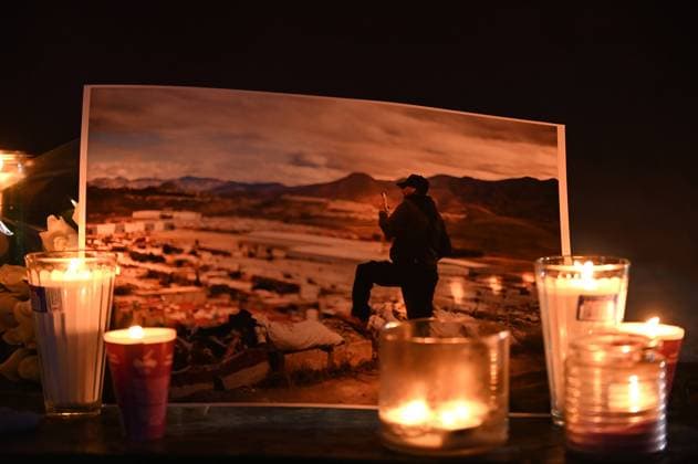 January 21, 2022, Tijuana, Baja California, Mexico: Colleagues of slain Tijuana photojournalist Margarito MartoÂ­nez Esquivel gathered to commemorate his life and passing at a candlelight vigil memorial in Tijuana, Mexico on Friday, January 21, 2022. ..Esquivel was assassinated on Monday by gun point steps away from his home as he was leaving to work (he was one of TijuanaÃ¢â‚¬â ¢s most prominent and regular photographers covering the cityÃ¢â‚¬â ¢s violence). ..He leaves a wife and a 16 year old daughter behind, as well as a city left without a consistent experienced daily reporter on the police beat. Tijuana Mexico - ZUMAm180 20220121_zip_m180_006 Copyright: xCarlosxA.xMorenox