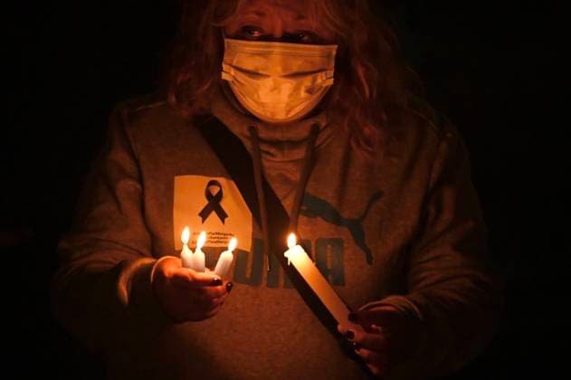January 21, 2022, Tijuana, Baja California, Mexico: Colleagues of slain Tijuana photojournalist Margarito MartoÂ­nez Esquivel gathered to commemorate his life and passing at a candlelight vigil memorial in Tijuana, Mexico on Friday, January 21, 2022. ..Esquivel was assassinated on Monday by gun point steps away from his home as he was leaving to work (he was one of TijuanaÃ¢â‚¬â ¢s most prominent and regular photographers covering the cityÃ¢â‚¬â ¢s violence). ..He leaves a wife and a 16 year old daughter behind, as well as a city left without a consistent experienced daily reporter on the police beat. Tijuana Mexico - ZUMAm180 20220121_zip_m180_007 Copyright: xCarlosxA.xMorenox
