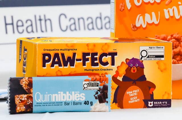June 30, 2022, Ottawa, Ontario, CAN: Mock packaging displays are seen during the new Health Canada labeling announcement in Ottawa on Thursday, June 30, 2022. Canada will require that companies add nutrition warnings to the front of pre-packaged food with high levels of saturated fat, sugar or sodium, starting in 2026. Ottawa CAN  - ZUMAc35_ 20220630_zaf_c35_031 Copyright: xSeanxKilpatrickx
