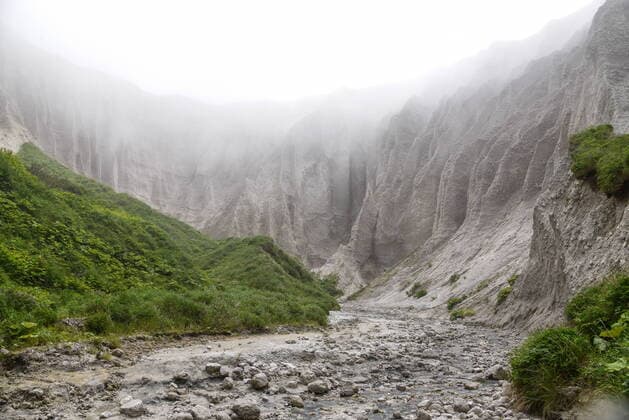 Creative Highlights World SAKHALIN REGION, RUSSIA â€“ JULY 1, 2022: Fog shrouds White Mountains on Iturup Island, the largest one of the Kuril Islands. Nikolai Mikhalchenko TASS  TS1388EF