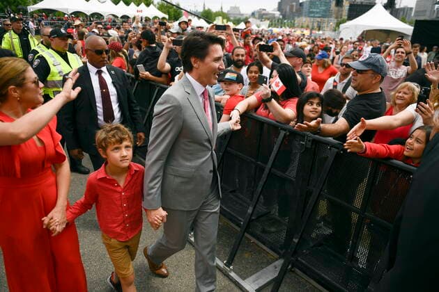 July 1, 2022, Ottawa, ON, CAN: Prime Minister Justin Trudeau greets members of the public as he arrives for the noon hour show with his wife Sophie Gregoire Trudeau and son Hadrien, during Canada Day celebrations at LeBreton Flats in Ottawa, on Friday, July 1, 2022. Ottawa CAN  - ZUMAc35_ 20220701_zaf_c35_043 Copyright: xJustinxTangx