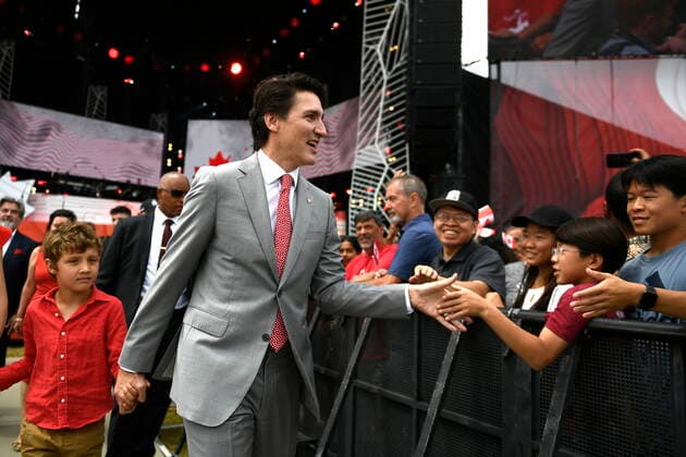 July 1, 2022, Ottawa, ON, CAN: Prime Minister Justin Trudeau greets members of the public as he arrives for the noon hour show with his son Hadrien, during Canada Day celebrations at LeBreton Flats in Ottawa, on Friday, July 1, 2022. Ottawa CAN  - ZUMAc35_ 20220701_zaf_c35_044 Copyright: xJustinxTangx