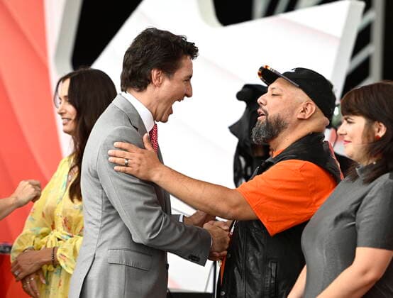 July 1, 2022, Ottawa, ON, CAN: Prime Minister Justin Trudeau speaks with DJ Shub as he greets performers at the end of Canada Day celebrations at LeBreton Flats in Ottawa, on Friday, July 1, 2022. Ottawa CAN  - ZUMAc35_ 20220701_zaf_c35_130 Copyright: xJustinxTangx