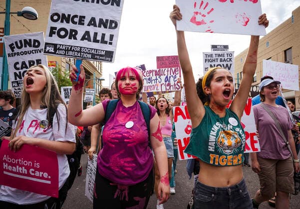 July 1, 2022, USA: People march with signs on Central Avenue during the Emergency March: Abortion Access in All 50 States in Albuquerque, New Mexico on Friday, July 1, 2022. Over 50 people gathered to rally and march in demand of President Biden to take immediate emergency action for abortion rights. The event was hosted by the Party for Socialism and Liberation. USA - ZUMAab1_ 20220701_zaf_ab1_006 Copyright: xAlbuquerquexJournalx