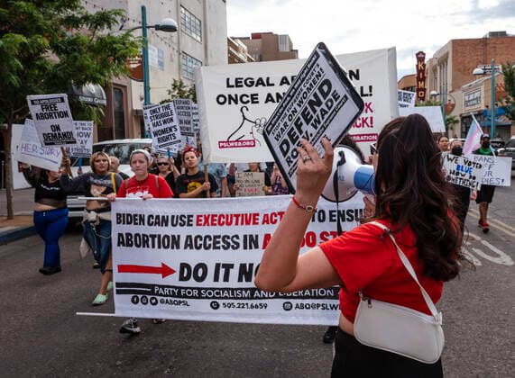 July 1, 2022, USA: Demonstrators march with signs on Central Avenue during the Emergency March: Abortion Access in All 50 States in Albuquerque, New Mexico on Friday, July 1, 2022. Demonstrators gathered to rally and march in demand of President Biden to take immediate emergency action for abortion rights. The event was hosted by the Party for Socialism and Liberation. USA - ZUMAab1_ 20220701_zaf_ab1_010 Copyright: xAlbuquerquexJournalx