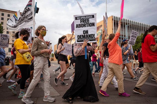 July 1, 2022, USA: Demonstrators march with signs on Central Avenue during the Emergency March: Abortion Access in All 50 States in Albuquerque, New Mexico on Friday, July 1, 2022. Demonstrators gathered to rally and march in demand of President Biden to take immediate emergency action for abortion rights. The event was hosted by the Party for Socialism and Liberation. USA - ZUMAab1_ 20220701_zaf_ab1_012 Copyright: xAlbuquerquexJournalx