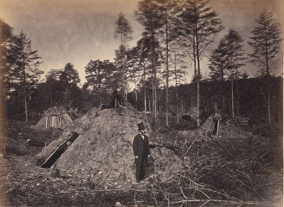Woodchoppers Huts in a Virginia Forest. On the Orange & Alexandria Railroad. Wood Supplied U.S.M.R. Railroads under Supervision of Major Brayton June 1863 Andrew Joseph Russell Commissioned by the United States Military Railroad to document all its operations, Russell seized the opportunity to record perhaps the most curious habitations of the Civil War: the crude, teepee-shaped mud and timber dwellings built by migratory woodcutters along the forested route of the Orange & Alexandria Railroad in northern Virginia. The habitations were constructed and primarily inhabited by African American men employed by the Union army to chop timber for railroad ties and bridges and fuel for military locomotives.. Woodchoppers Huts in a Virginia Forest Copyright: xpiemagsx Metbot-31806