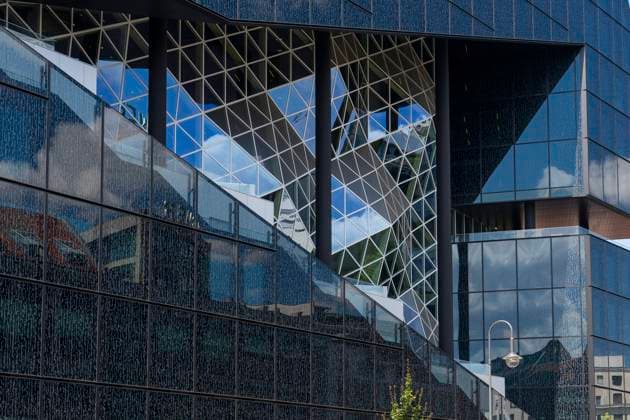The modern facade of the Axel Springer new building in Axel Springer Straße in Berlin Kreuzberg, which will be inaugurated in 2020 Tinted glass surfaces and building elements in 3D optics form the facade Photo Volker Hohlfeld Axel Springer New Building