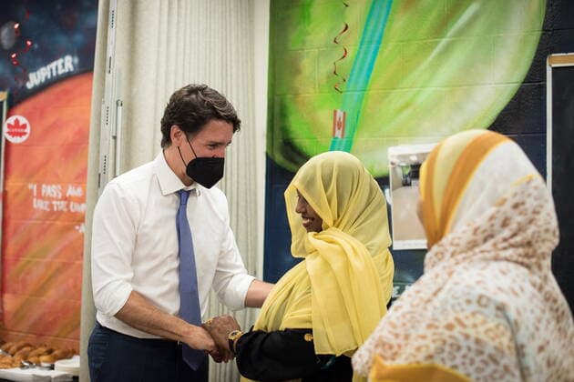 July 5, 2022, Etobicoke, ON, CANADA: Prime Minister Justin Trudeau, left, shakes hands with community members at the start of a gun violence roundtable at Rexdale Community Centre in Etobicoke, Ont., on Tuesday, July 5, 2022. Etobicoke CANADA - ZUMAc35_ 20220705_zaf_c35_001 Copyright: xTijanaxMartinx