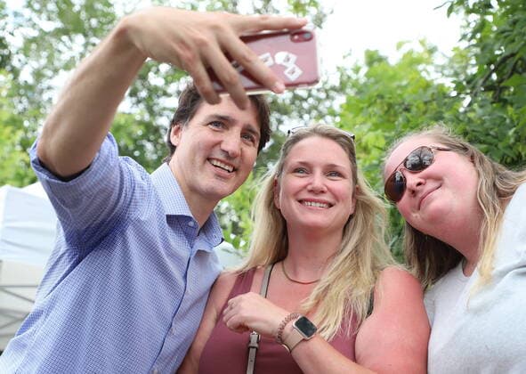 July 7, 2022, Sudbury, ON, CANADA: Prime Minister Justin Trudeau greets supporters at the Science North Farmers Market in Sudbury, Ont., Thursday, July 7, 2022, where the Prime Minister and Dr. Jane Goodall took part in the historic planting of Greater SudburyöÄÃ s 10 millionth tree. Sudbury CANADA  - ZUMAc35_ 20220707_zaf_c35_058 Copyright: xGinoxDonatox