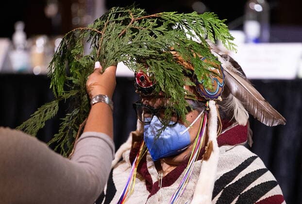 July 7, 2022, VANCOUVER, BC, CANADA: Assembly of First Nations National Chief RoseAnne Archibald is brushed with cedar branches during a brushing ceremony at the conclusion of the AFN annual general meeting, in Vancouver, on Thursday, July 7, 2022. VANCOUVER CANADA  - ZUMAc35_ 20220707_zaf_c35_063 Copyright: xDarrylxDyckx