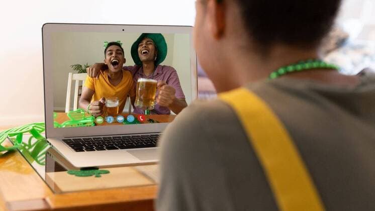IMAGO Creative, Jahreszeit Herbst, Ferien Mixed race woman making st patrick s day video call to friends holding beers on laptop at home Mixed race woman making st patrick s day video call to friends holding beers on laptop at home. celebrating the irish patron saint s day at home in isolation during quarantine lockdown., model released, , property released, Cork, Ireland, 2021-03-03T10:36:18.000Z, 1412930.jpg, people,bi racial,woman,making,st,patrick day,video call,friend,holding,beer,laptop,home isolation,celebrating,irish,patron,saint,quarantine,ireland,coronavirus,covid,pandemic,epidemic,patrick,computer,alcohol,online,virus,shamrock,notebook,clover,corona,using,infection,pub,internet,outbreak,lager,mixed,race,day,video,call,home,isolation Young Adult,Woman,Female,Mixed-Race,M