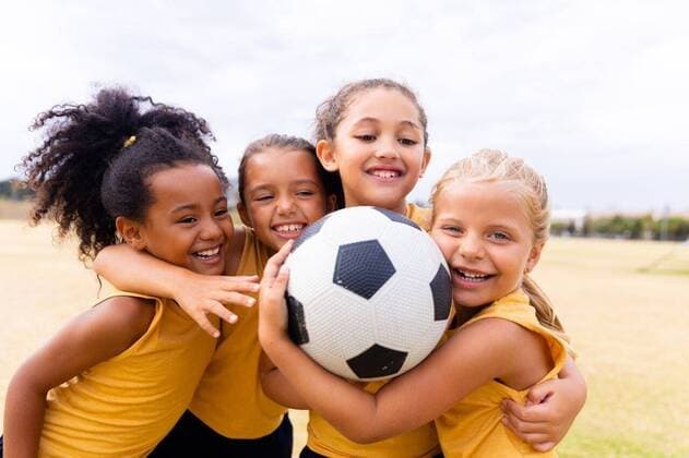 Happy multiracial elementary schoolgirls with soccer ball embracing while standing on ground Happy multiracial elementary schoolgirls with soccer ball embracing while standing on ground. unaltered, childhood, education, together, sports training and sports activity concept., model released, , property released, Cape Town, South Africa, , 3125683.jpg, people,happy multiracial,elementary,schoolgirl,soccer ball,embracing,standing,ground,unaltered,childhood education,together,sport,training,activity,concept,exercise,fitness,active,recreation,workout,athlete,leisure,fit,lifestyle,athletic,young,fun,person,gym,action,childhood,adult,healthy,happy,multiracial,soccer,ball,education Child,Girl,Female,Mixed-Race,Caucasian