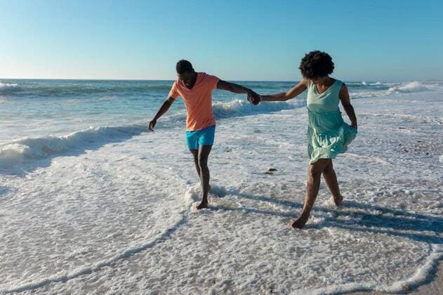 Creative Highlights Symbolbilder African american couple holding hands wading on shore at beach against sky during sunny day African american couple holding hands wading on shore at beach against sky during sunny day. unaltered, lifestyle, love, togetherness and holiday concept., model released, , property released, Cape Town, South Africa, , 3137198.jpg, people,african american,couple,holding hand,wading,shore,beach,sky,sunny day,unaltered,lifestyle,love,togetherness,holiday concept,coast,sea,ocean,vacation,sand,summer,travel,landscape,together,water,happy,young,outdoor,beautiful,nature,coastline,tourism,leisure,sun,relationship,african,american,holding,hand,sunny,day,holiday,concept Young Adult,Man,Male,Black,Woman,Female