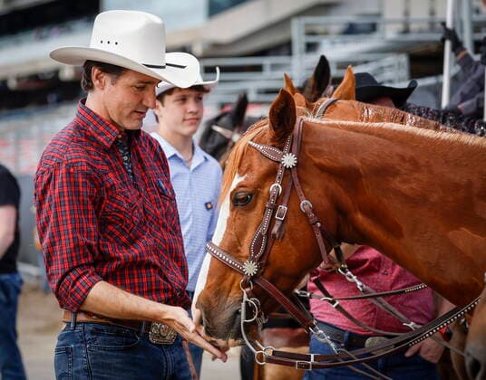 July 10, 2022, Calgary, AB, CANADA: Prime Minister Justin Trudeau takes in the sights at the Calgary Stampede in Calgary, Alta., Sunday, July 10, 2022. Calgary CANADA  - ZUMAc35_ 20220710_zaf_c35_030 Copyright: xJeffxMcintoshx