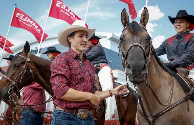 July 10, 2022, Calgary, AB, CANADA: Prime Minister Justin Trudeau takes in the sights at the Calgary Stampede in Calgary, Alta., Sunday, July 10, 2022. Calgary CANADA  - ZUMAc35_ 20220710_zaf_c35_031 Copyright: xJeffxMcintoshx