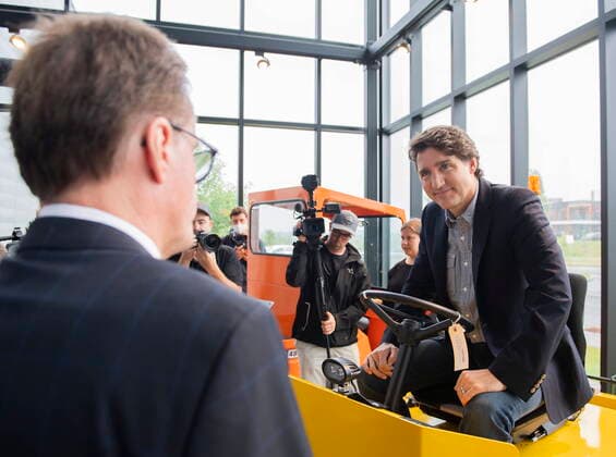 July 12, 2022, Sherbrooke, PQ, Canada: Prime Minister Justin Trudeau talks to Motrec CEO Blair McIntosh during a tour of the heavy-duty electric vehicle production facility in Sherbrooke, Que., Tuesday, July 12, 2022. Sherbrooke Canada  - ZUMAc35_ 20220712_zaf_c35_014 Copyright: xGrahamxHughesx