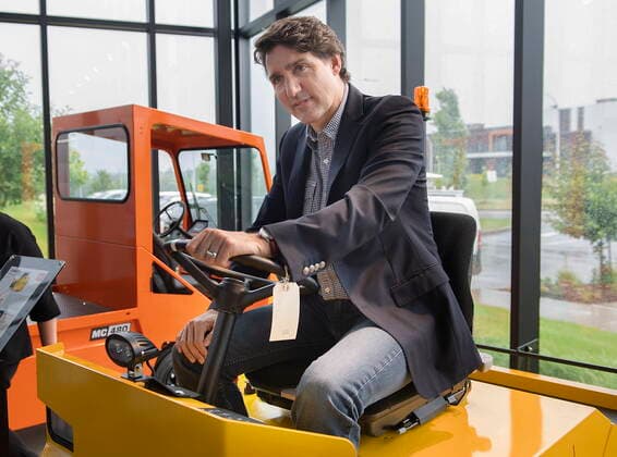July 12, 2022, Sherbrooke, PQ, Canada: Prime Minister Justin Trudeau sits in a MT 340 tractor during a tour of Motrec, a heavy-duty electric vehicle production facility in Sherbrooke, Que., Tuesday, July 12, 2022. Sherbrooke Canada  - ZUMAc35_ 20220712_zaf_c35_024 Copyright: xGrahamxHughesx