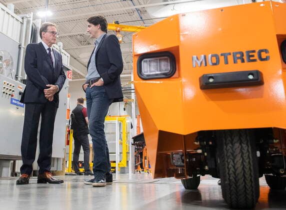 July 12, 2022, Sherbrooke, PQ, Canada: Prime Minister Justin Trudeau talks with Motrec CEO Blair McIntosh during a tour of Motrec, a heavy-duty electric vehicle production facility in Sherbrooke, Que., Tuesday, July 12, 2022. Sherbrooke Canada  - ZUMAc35_ 20220712_zaf_c35_025 Copyright: xGrahamxHughesx