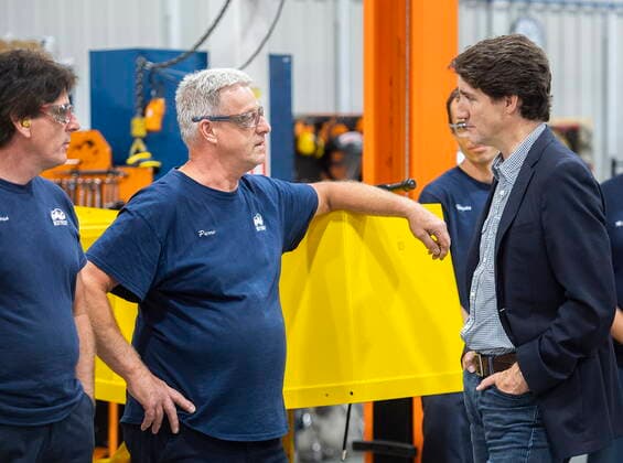 July 12, 2022, Sherbrooke, PQ, Canada: Prime Minister Justin Trudeau to workers during a tour of Motrec, a heavy-duty electric vehicle production facility in Sherbrooke, Que., Tuesday, July 12, 2022. Sherbrooke Canada  - ZUMAc35_ 20220712_zaf_c35_027 Copyright: xGrahamxHughesx