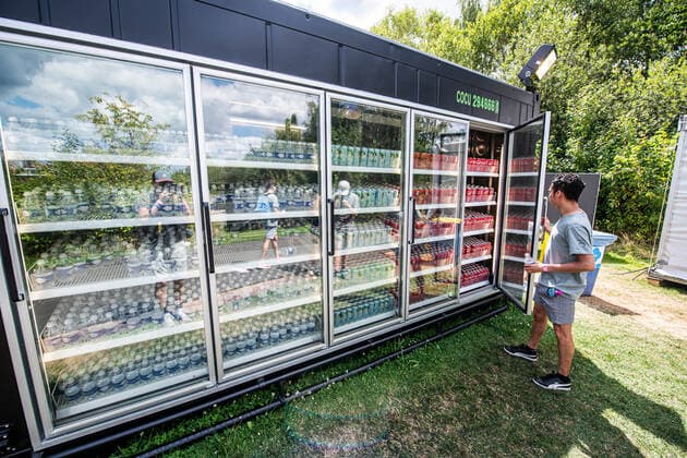 Illustration picture shows a refrigerated container containing free water and soft drinks for crew at the first day of the Tomorrowland electronic music festival, Friday 15 July 2022, in Boom. The 16th edition of the festival takes place on three weekends at the De Schorre terrain in Boom, from 15 to 17 July, from 22 to 24 July 2022 and from 29 to 31 July. The festival had to be postponed for two years in the ongoing corona virus pandemic.  JONASxROOSENS 37506670