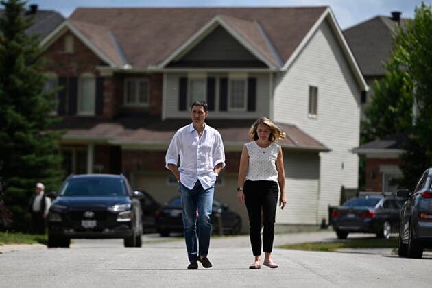 July 15, 2022, Ottawa, ON, CAN: Prime Minister Justin Trudeau arrives with Liberal MP Jenna Sudds to speaking with a family about the Climate Action Incentive Payment at their home in Ottawa, on Friday, July 15, 2022. Ottawa CAN  - ZUMAc35_ 20220715_zaf_c35_042 Copyright: xJustinxTangx
