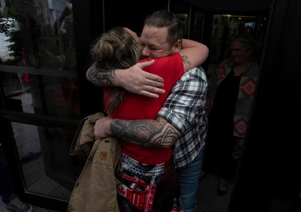 July 18, 2022, Ottawa, ON, Canada: Pat King hugs his girlfriend as he emerges from the courthouse after receiving bail, Monday, July 18, 2022 in Ottawa. Ottawa Canada  - ZUMAc35_ 20220718_zaf_c35_002 Copyright: xAdrianxWyldx