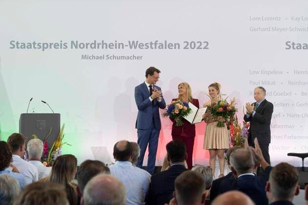 from left Hendrik WUEST, Wüst, CDU, State President of North Rhine Westphalia, Corinna SCHUACHER, Gina SCHUMACHER, with the State Prize certificate for Michael Schumacher, Jean TODT, former team boss Ferrari, red carpet, red carpet show, arrival, arrival, awarding of the State Prize of the State of North Rhine Westphalia in Cologne on 20 07 2022