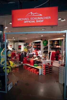 View into the official fan store of Michael Schumacher in the Motorworld, feature, border motive, fan articles, award of the state prize of the country North Rhine Westphalia in Cologne on 20 07 2022