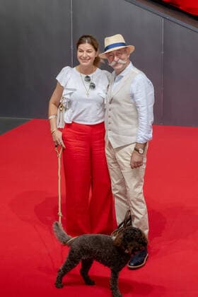 Horst Lichter, wife Nada with dog on the red carpet State Prize of the State of North Rhine-Westphalia for 7-time Formula 1 World Champion Michael Schumacher In the Motorworld in Cologne, Minister President Hendrik Wüst presented the State Prize to wife Corinna and daughter Gina Maria Schumacher, who accepted the prize on behalf