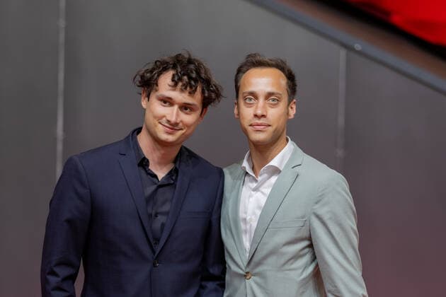 Lukas Brenner, MdB and Tim Achtermeyer, MdL and NRW Chairman of Bündnis 90 Die Grünen on the red carpet State Prize of the State of North Rhine-Westphalia for 7 times Formula 1 World Champion Michael Schumacher In the Motorworld in Cologne, Prime Minister Hendrik Wüst prese