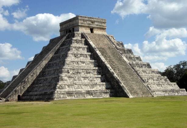 La Piramide, known as the Temple of Kukulca, a Mesoamerican step-pyramid that dominates the centre of the Chichen Itza archaeological site in the Mexican state of Yucatan. The pyramid building is more formally designated by archaeologists as Chichen Itza Structure 5B18. Built by the pre-Columbian Maya civilization between the 8th and 12th centuries AD, the pyramid served as a temple to the deity Kukulcan, the Yucatec Maya Feathered Serpent deity closely related to Quetzalcoatl WorldxHistoryxArchive 917_11_WHA_188_0171