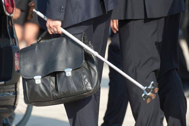 Italy, Rome, Vatican, 22 07 24. A papal butler carries the briefcase and walking stick of Pope Francis as he arrives at Fiumucino airport to board the plane that will fly him to Canada for his Apostolic Journey, at Fiumucino airport. Un maggiordomo papale porta la valigetta e il bastone da passeggio di Papa Francesco mentre arriva all aeroporto di Fiumucino per imbarcarsi sull aereo che lo porterÃ in Canada per il suo Viaggio Apostolico, all aeroporto di Fiumucino. Photo by Massimiliano MIGLIORATO Catholic Press Photo  Copyright: x MASSIMILIANOxMIGLIORATO CPPx x xCatholicxPressxPhotox