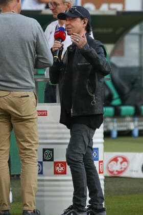 Lower Saxony, Hannover, Klaus Meine frontman of the Scorpions at the match Hannover 96 against St Pauli in the Heinz von Heiden Arena to Hannover, their song hr Rock you like a Hurricane is new entrance song at 96,