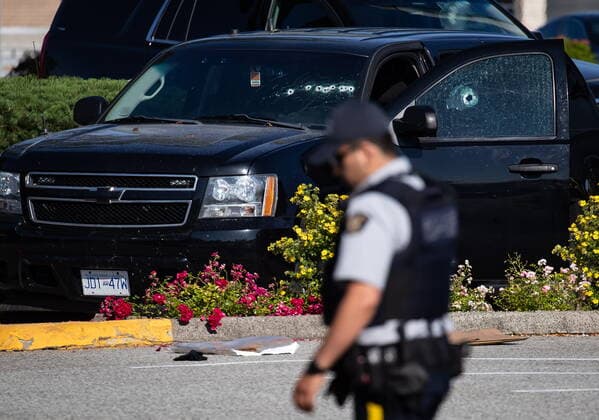 July 25, 2022, LANGLEY, BC, CANADA: Bullet holes are seen in the windshield and passenger window of an RCMP vehicle at the scene of a shooting, in Langley, B.C., on Monday, July 25, 2022. A suspect is in custody after several people were shot in the Metro Vancouver city of Langley, RCMP said. Police issued a blaring cellphone alert at about 6:20 Monday morning, saying they were at the scenes of several shootings involving transient victims. LANGLEY CANADA - ZUMAc35_ 20220725_zaf_c35_113 Copyright: xDarrylxDyckx