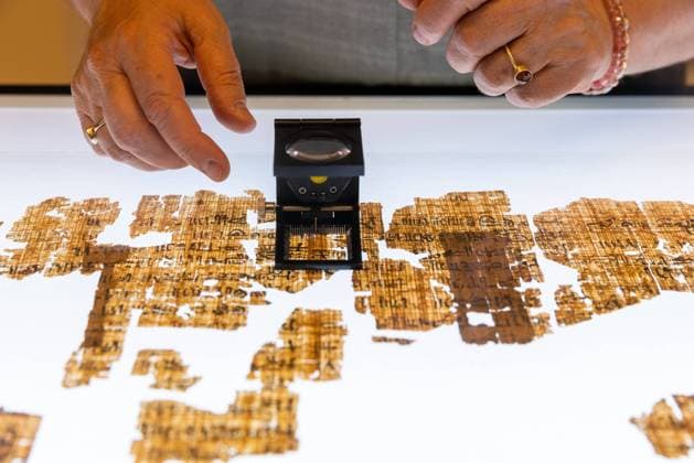 Museo Egizio Di Torino: Turin Royal Canon Restoration A lens is used to observe against the light the fibers and textures of the papyrus already placed to try to connect the fragments of the papyrus known as the Turin King List. The difficult part is finding the right position using the texture, the orientation of the fibers, and the literal content.¨The Turin King List, also known as the Turin Royal Canon, is an ancient Egyptian hieratic papyrus dated to Ramesses II s reign (1290 a.C. - 1224 a. C). The papyrus is the most complete list available of kings compiled by the ancient Egyptians. Now is a series of small fragments after the disgregation during the transport in Italy made by Drovetti after the discovery in Luxor. The restorati  Copyright: xMauroxUjettox originalFilename: ujetto-museoegi220725_np2mO.jpg